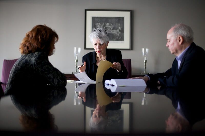 Older couple meeting in conference room with Kate Vetrano |Gray Divorce | Vetrano | Vetrano & Feinman