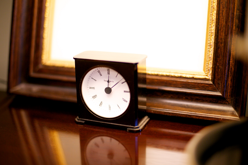 image of clock on a desk in front of a frame - Vetrano Vetrano and Feinman Family Lawyer Discusses Changes to Alimony